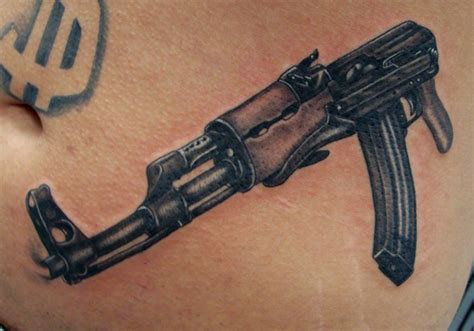 Unleash Your Inner Warrior with Draco Gun Tattoo Designs